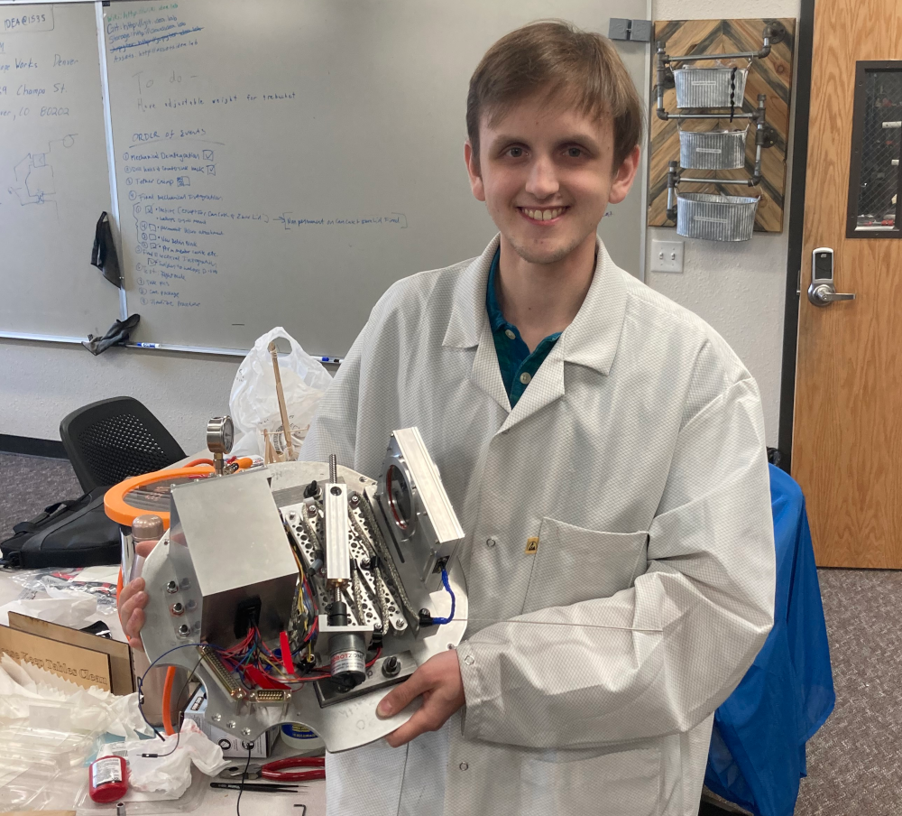 The fully assembled payload and I after a successful test